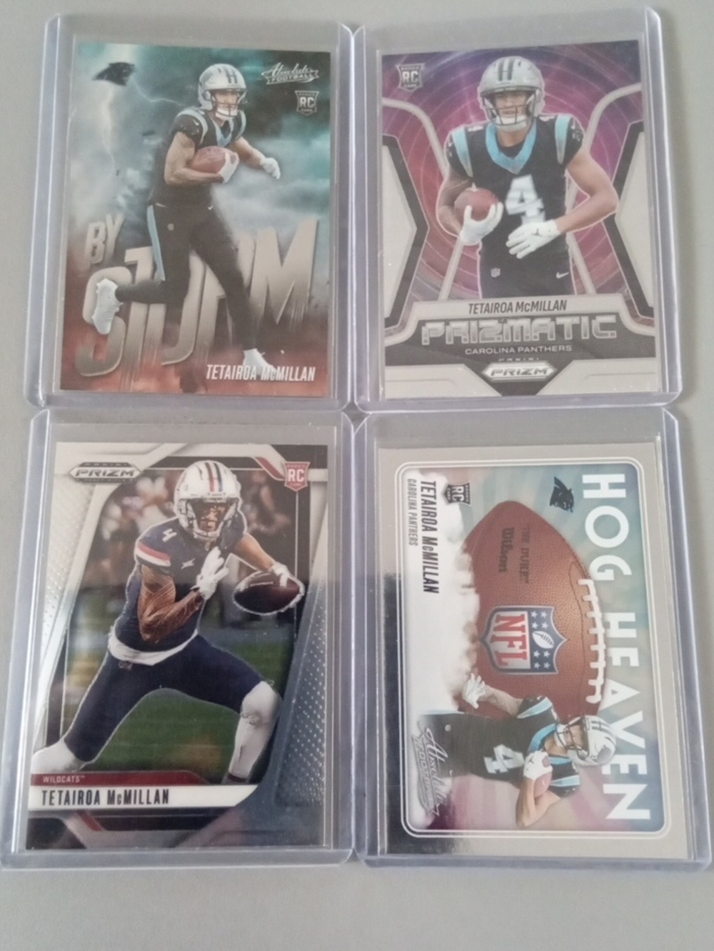 Panini Tetairoa McMillan Football Trading Card Lot — Black, Teal, Silver Accents